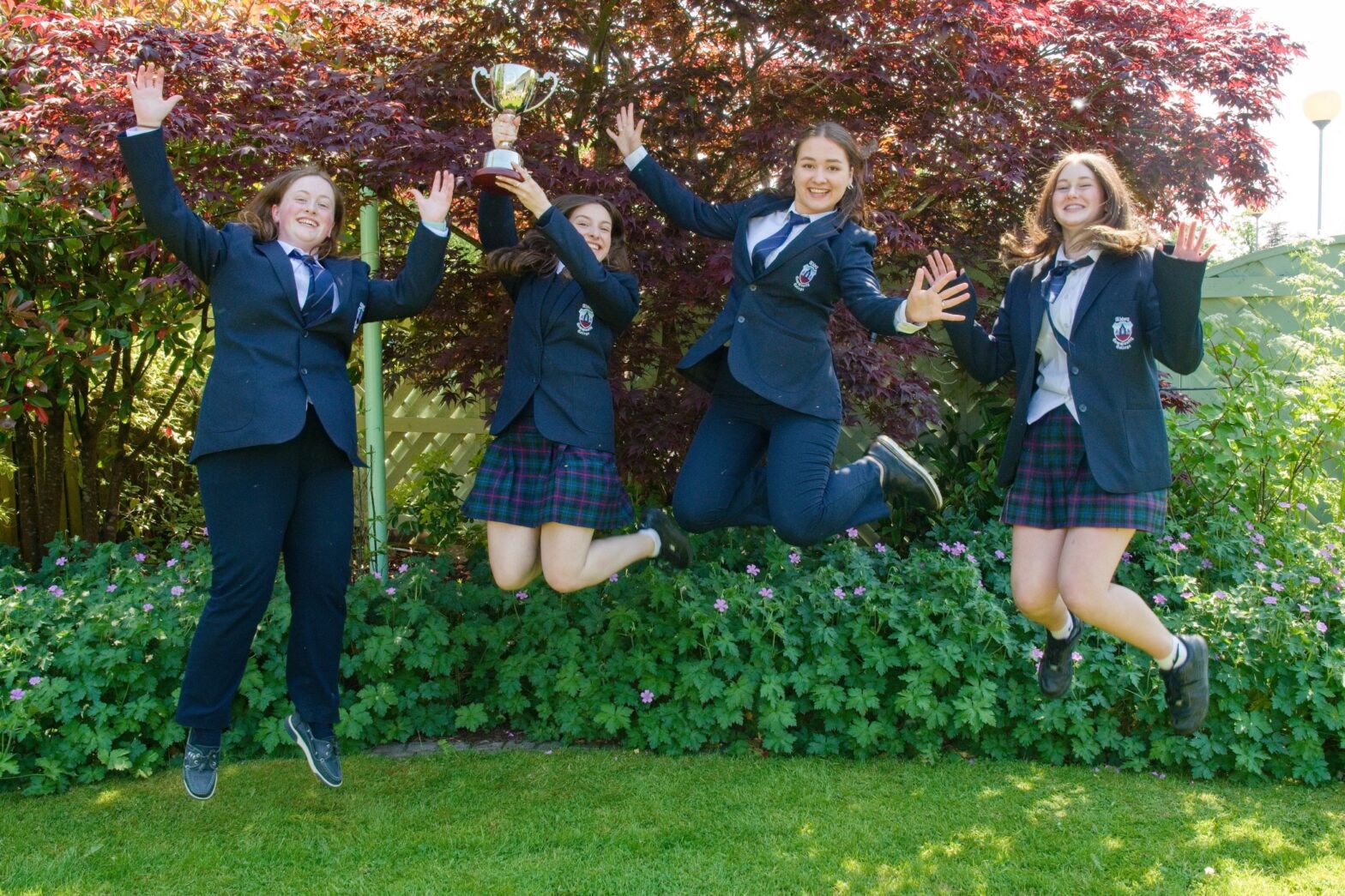 Kate Ann Daniels, Mara Matthews, Vita Marohnic and Saoirse Corcoran celebrate their win
