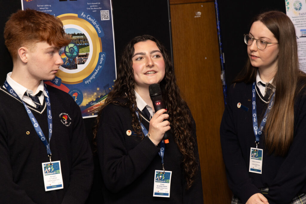 students presenting at conference