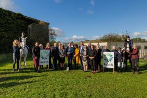 group photo with horses and branding